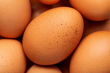 Organic brown eggs background