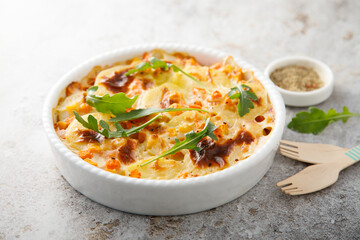 Homemade potato gratin with pumpkin