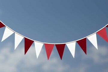Vibrant red and white bunting festively hanging with triangular flags for celebrations.