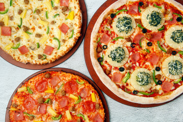 Freshly cooked Pizza with assorted toppings