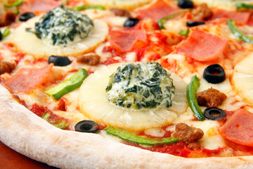 Freshly cooked Pizza with assorted toppings