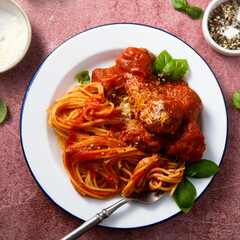 Spaghetti with meatballs and Parmesan cheese