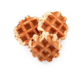 Many delicious Belgian waffles isolated on white, top view