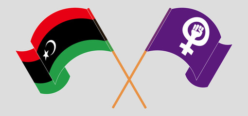 Crossed and waving flags of Libya and Feminism - obrazy, fototapety, plakaty