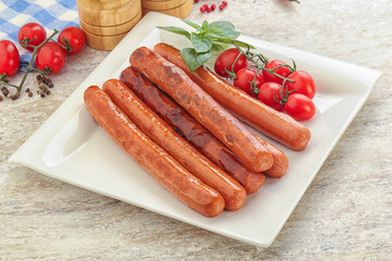 Roasted sausages in the plate