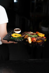 meat board on a black background