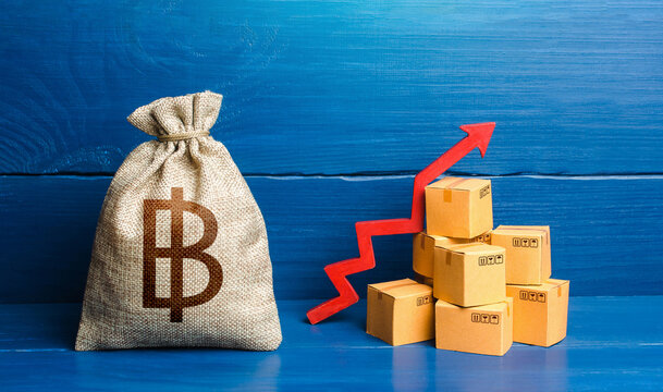 Thai baht money bag with boxes and up arrow. Good consumer sentiment and demand for goods. Income increase, acceleration and growing of economy. High sales. Production rise. Growing prices
