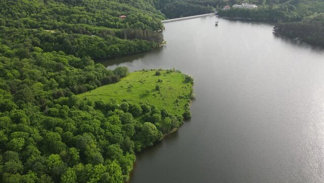 Aerial Spring view of Dushantsi Reservoir, Sredna Gora Mountain, Sofia Region, Bulgaria