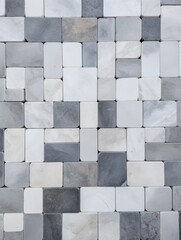  a close up of a wall made up of small squares of gray, white and grey marble with a black and white clock in the middle of the middle of the wall.