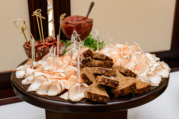 Meat cutting and its presentation on the festive table