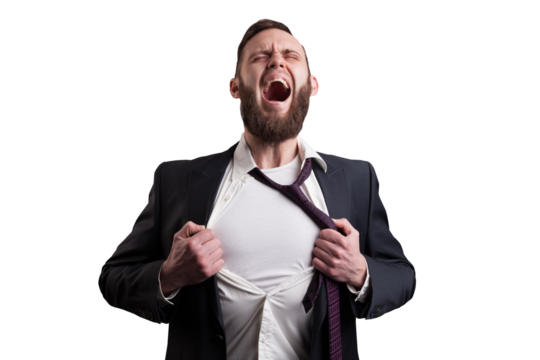 Businessman screaming and tearing apart his suit