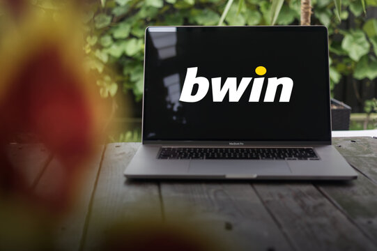 Bwin logo (Betandwin), Austrian online betting brand, displayed on MacBook Pro screen