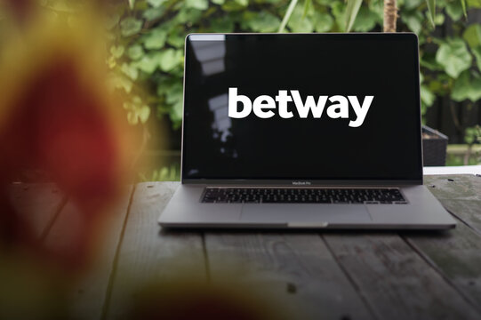 Betway logo, online gambling company offering betting and gambling products including sportsbook and online casino, displayed on MacBook Pro screen