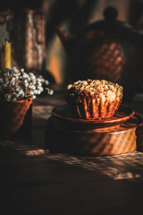 Chocolate caramel muffin on a dark background.