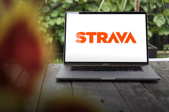Strava logo, American fitness tracking app and website, displayed on MacBook Pro screen