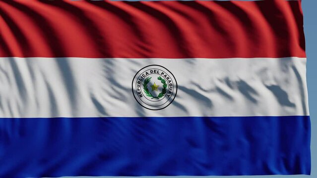 Close-up of the national flag of Paraguay flutters in the wind on a sunny day , 4k slow motion