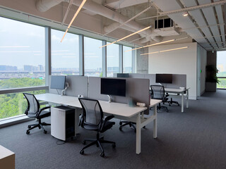 Interior of modern empty office building.Open white ceiling design.