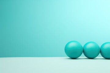  a group of three blue eggs sitting on top of a white table next to a blue wall and a light blue wall behind the three eggs are in the same row.