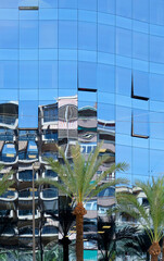Modern office building with colours and mirrored reflections
