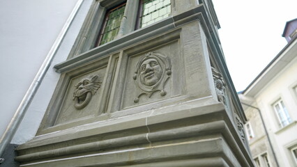 Traditional adornment on European building symbolizing the medieval trickster archetype