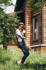 Woman with eco bag with fruit in a country side