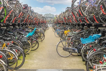 Fotobehang Big Two-Levels Bicycle Parking in Amsterdam © goodman_ekim