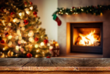 Fototapeta na wymiar Wooden table with blurred Christmas tree and fireplace background.