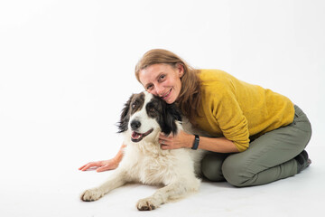 happy woman with her white dog