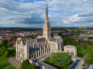 Fototapeta premium Stunning aerial view of the spectacular historical Salisbury Cathedral with the tallest spire, Salisbury, England, UK.