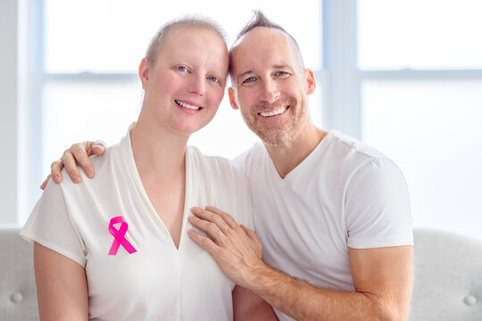 woman with Breast cancer in a bright room with her boyfriend