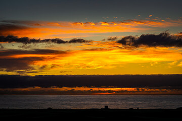 Obraz premium Sunrise over the Atlantic Ocean. Shot from the Dunes of Maspalomas Gran Canaria