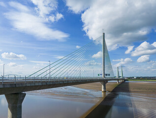 Fototapeta premium Liverpool, Merseyside, UK, September 13, 2023; aerial view of the Mersey Gateway toll bridge over the River Mersey, Liverpool, 