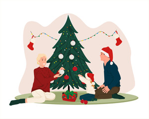 Obraz na płótnie Canvas Family decorating the Christmas tree. New year celebrations.