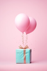Blue gift box with pink ballons on a pink background.pastel colors.Minimal concepte.
