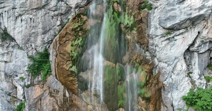 Beautiful waterfall in green forest, top view