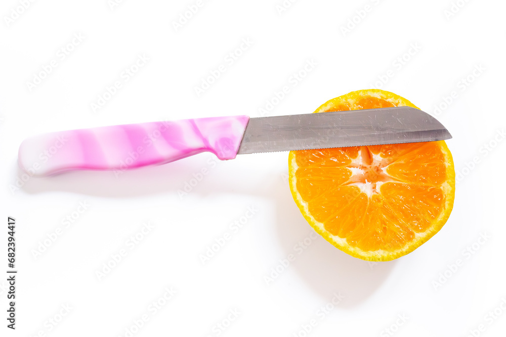 Poster sliced tangerine isolated on a white background with a knife. top view, copy space.