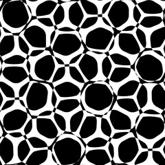 An abstract pattern featuring mosaic ornaments in black and white, perfect for background or backdrop purposes.