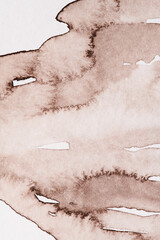 Abstract background, watercolor paint stains on white paper, brown ink