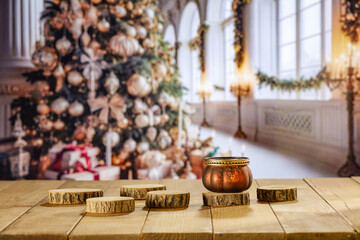 Yellow old wooden table and free space for your decoration. Blurred home interior with christmas...