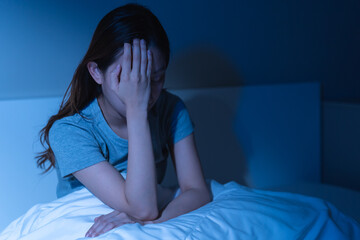 Sad worried and stressed, depressed asian young woman, girl suffering in bed from insomnia problem,...