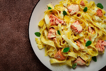 tagliatelle pasta, in cream sauce with salmon, homemade, no people,