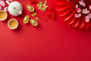 Lunar New Year Reunion Tradition. Top view table adorned with traditional Chinese New Year...