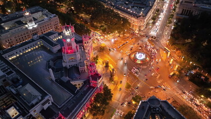 Aerial view of CentroCentro with red-lit tower in Madrid at night. center of the capital of Spain...
