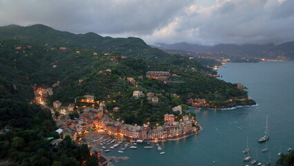 4k Drone shot of Portofino, village on the ligurian coast, Italian town on the mediterranean sea - 682437831