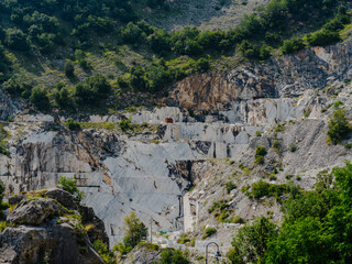 Fototapeta na wymiar Large blocks of marble in one of the quarries near Carrara, Italy