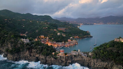 4k Drone shot of Portofino, village on the ligurian coast, Italian town on the mediterranean sea - 682438028