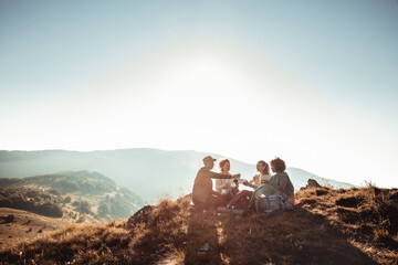 Friends Sharing a Toast on a Mountain Hike