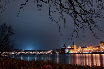 Prague, view of the Lesser Bridge Tower of Charles Bridge (Karluv Most) at night, Czech Republic.