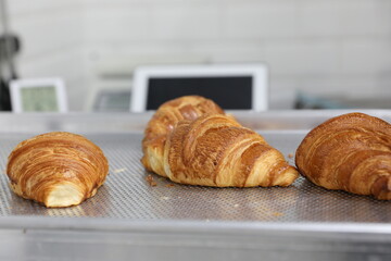 Baking croissants in a small bakery
