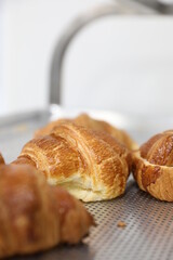 Baking croissants in a small bakery